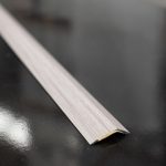 Ramp Reducer grey Colour Self Adhesive, an accessory used when installing laminate wood flooring