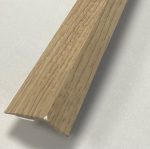 Ramp Reducer Oak Colour Self Adhesive, an accessory used when installing laminate wood flooring